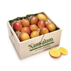 Fresh, organic, and naturally ripened golden mangoes arranged in a rustic basket, showcasing the vibrant colors and deliciousness of these tropical delights.